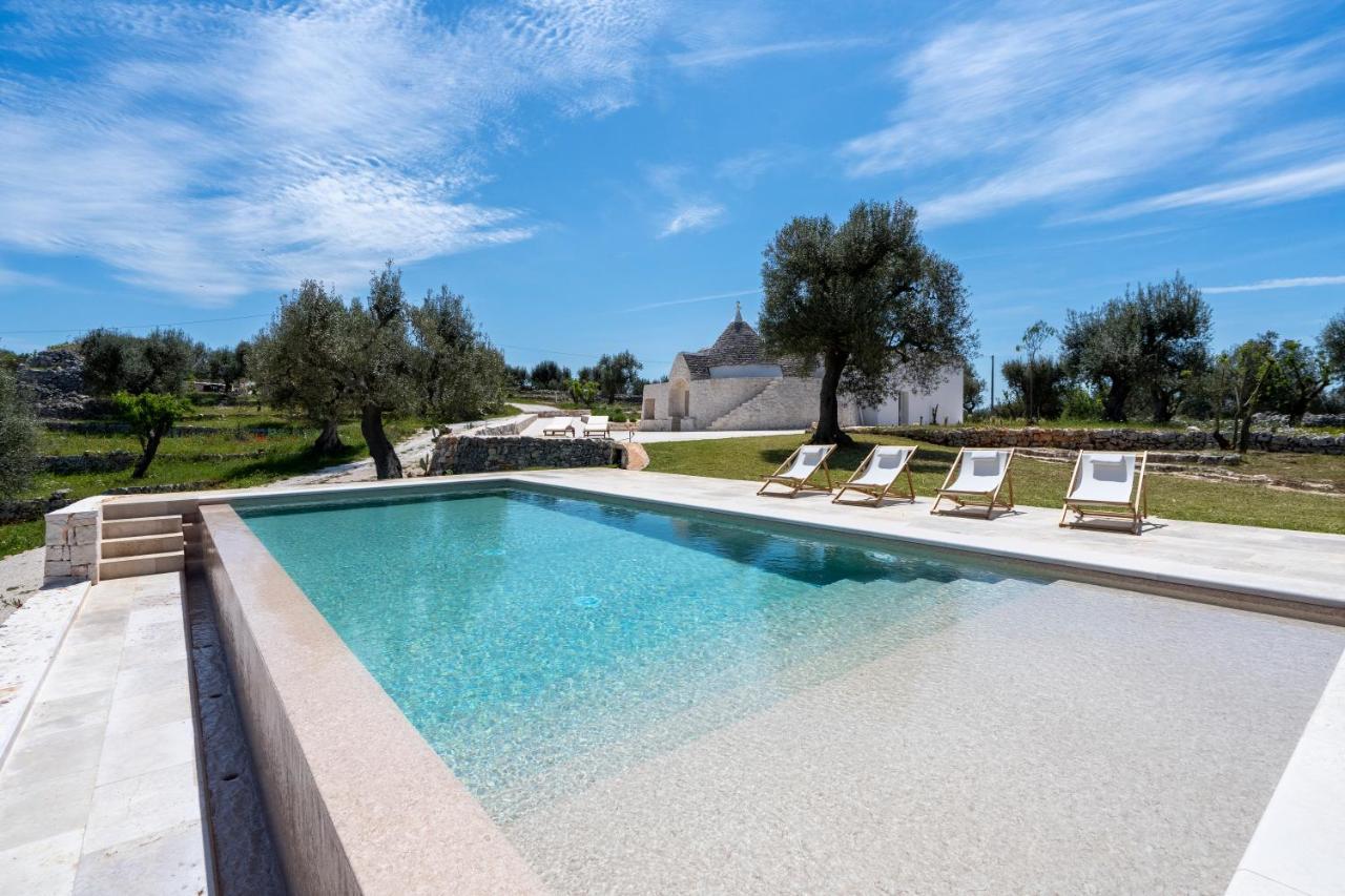 오스투니 Trulli Cicerali , Trulli Design Con Piscina Panoramica 빌라 외부 사진