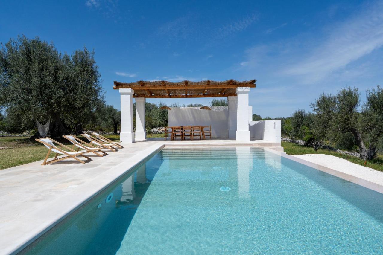 오스투니 Trulli Cicerali , Trulli Design Con Piscina Panoramica 빌라 외부 사진