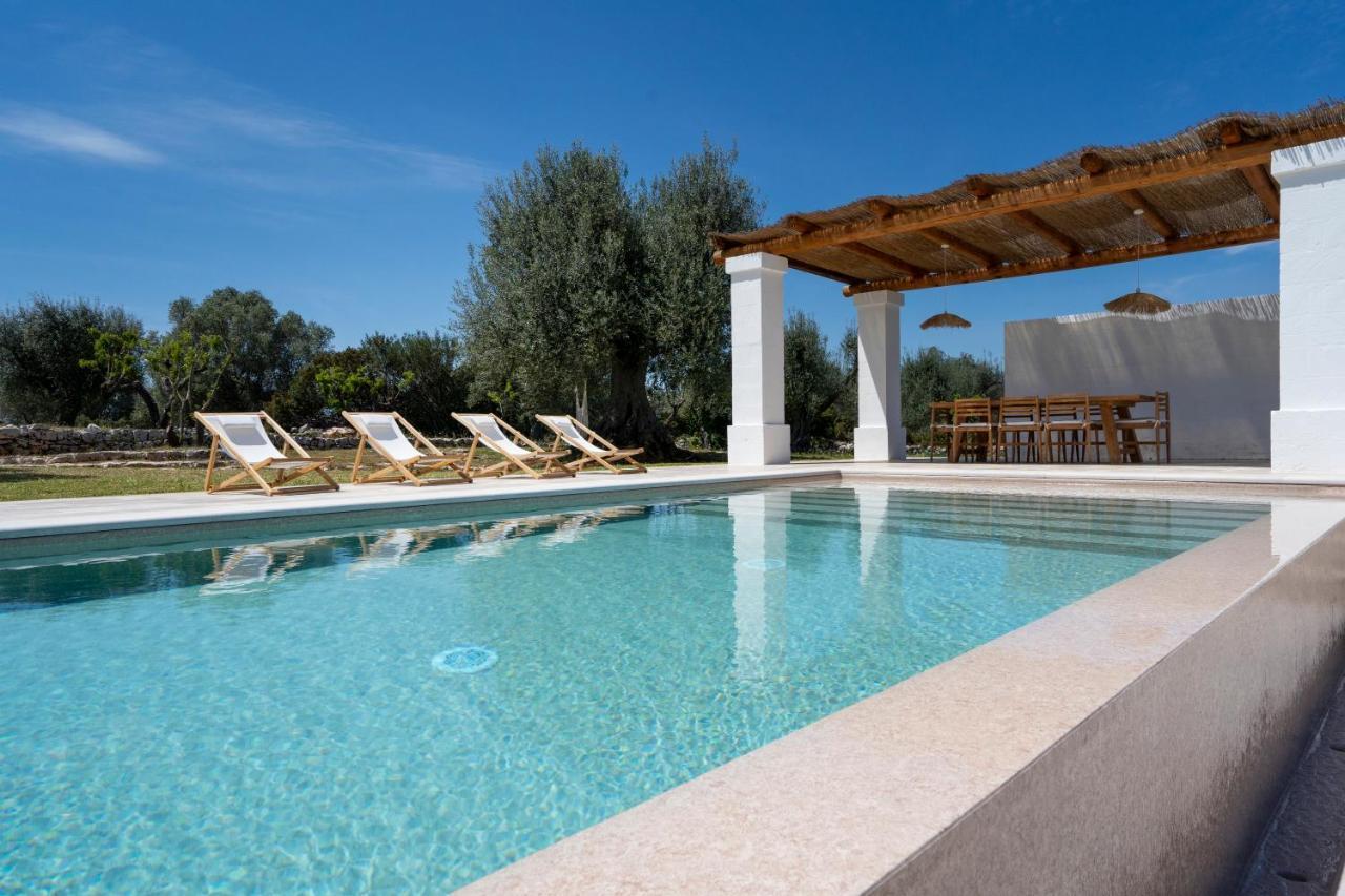 오스투니 Trulli Cicerali , Trulli Design Con Piscina Panoramica 빌라 외부 사진