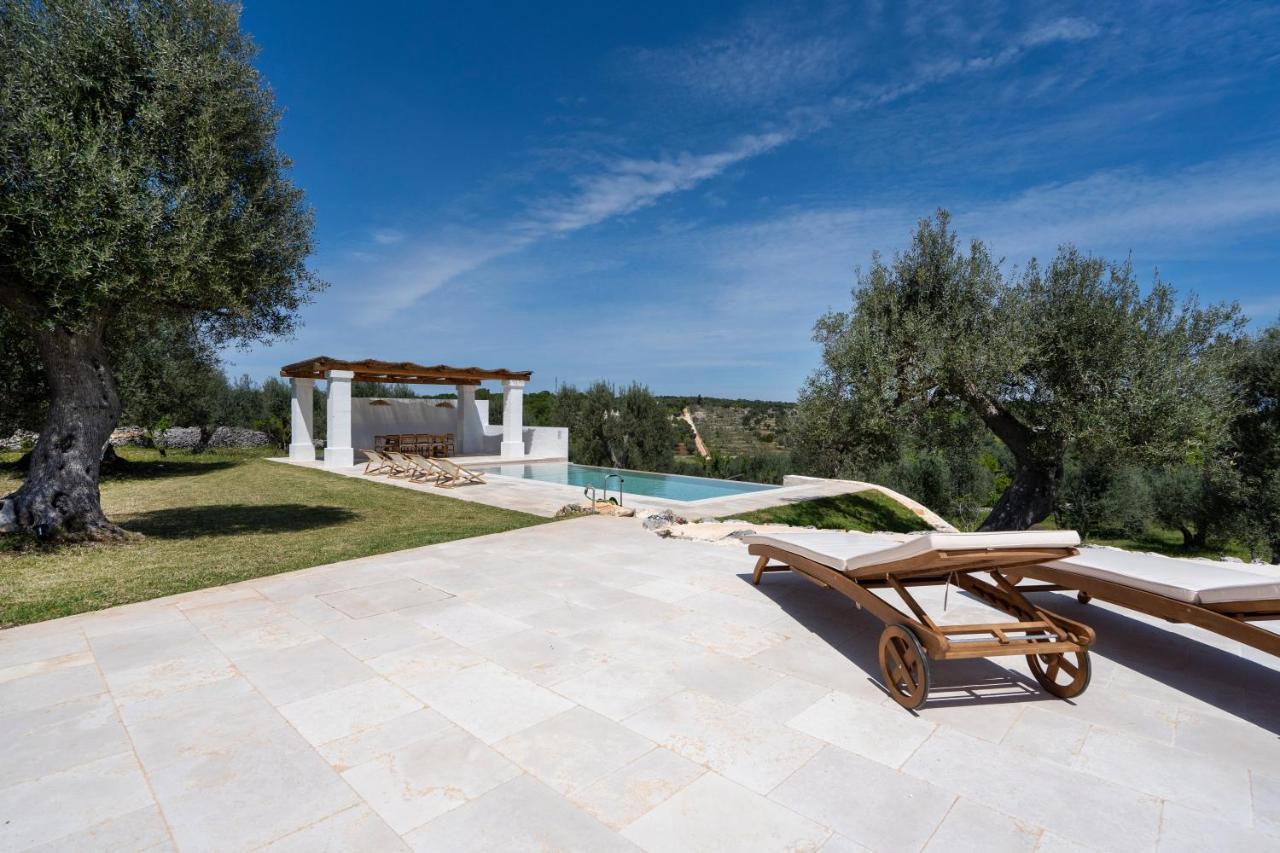 오스투니 Trulli Cicerali , Trulli Design Con Piscina Panoramica 빌라 외부 사진